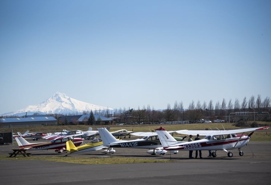 Planes are parked near the runway at Pearson Field in Vancouver on March 18. An internal audit of the Pearson Airport found that it lost at least $63,395 and potentially up to $149,211 in public funds over the last decade.