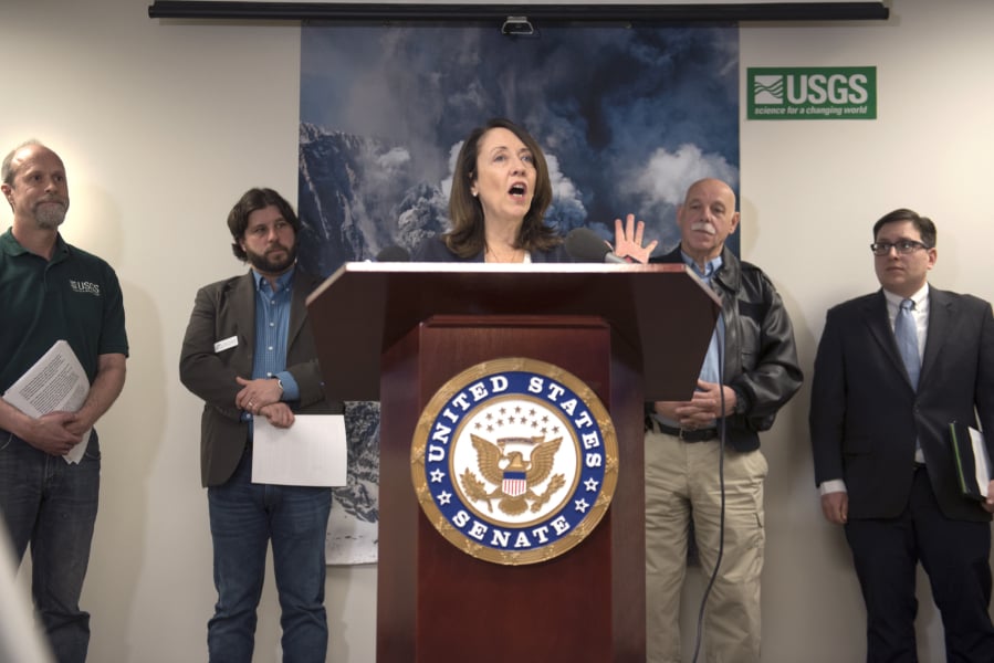 Seth Moran, scientist-in-charge at the U.S. Geological Survey Cascades Volcano Observatory, from left, Ray Yurkewycz, executive director of the Mount St. Helens Institute, U.S. Sen. Maria Cantwell, D-Wash., Ernie Schnabler, director of emergency management with the Cowlitz County Sheriff’s Office, and Dan Douthit, public information officer for the Portland Bureau of Emergency Communications, talk about the importance of volcano monitoring prior to a tour at the CVO on Thursday morning.
