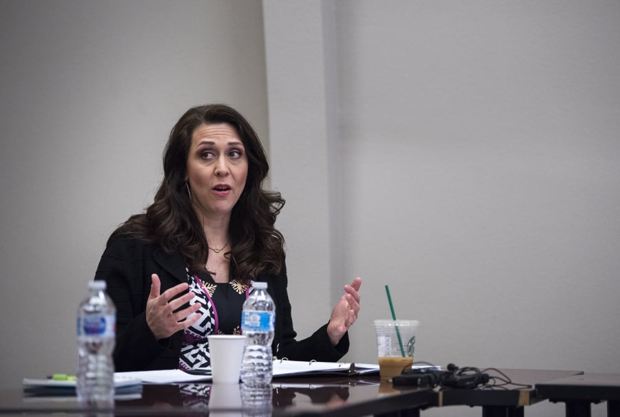 U.S. Rep. Jaime Herrera Beutler, R-Battle Ground, speaks with parents and child care providers and advocates during an open forum discussion on March 19 at YWCA Clark County in Vancouver.