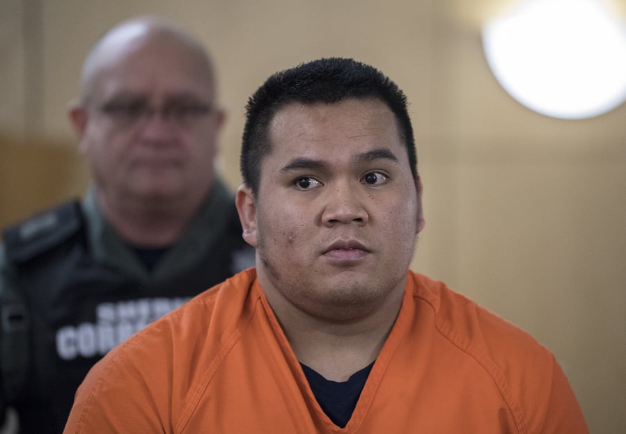Charson Lotius, who stabbed an acquaintance to death at a Vancouver convenience store in February 2018, leaves the courtroom after pleading guilty to first-degree manslaughter Wednesday afternoon in Clark County Superior Court.