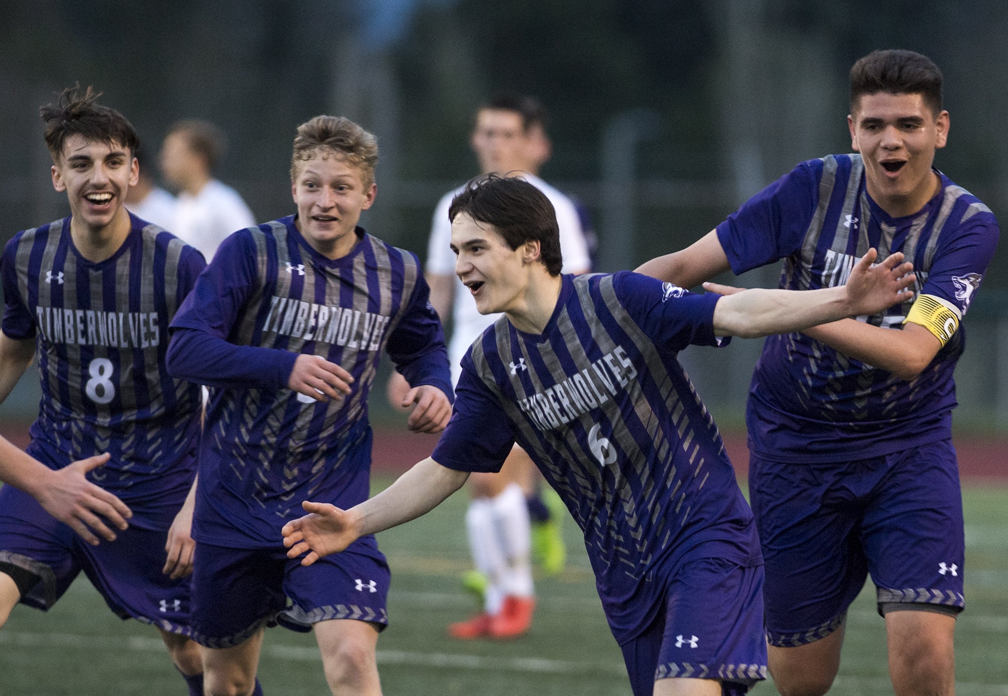 Heritage's Ibra Katchiev (6) celebrates his goal against Skyview during Tuesday night's soccer game at McKenzie Stadium in Vancouver on March 26, 2019.