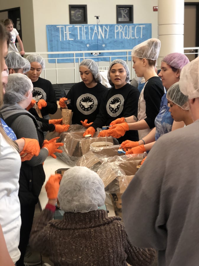 Clark County: Volunteers packing food at one of two Clark County events where volunteers worked in an assembly line to create more than 20,000 meals as part of a national effort sponsored by MOD Pizza and Generosity Feeds.