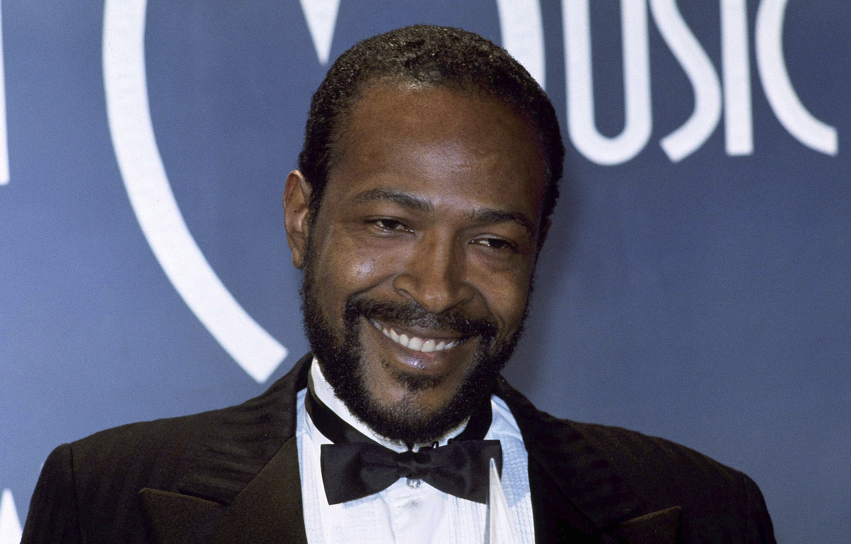 FILE - In this Jan. 17, 1983, file photo, singer-songwriter Marvin Gaye, winner of Favorite Soul/R&amp;B Single, "Sexual Healing," attends the American Music Awards in Los Angeles. Clothing, including a knit cap and military-style jacket and pants, worn by Gaye will go on display at the Motown Museum in Detroit as part of the music label's 60th anniversary celebration. Pictures of the items will be posted on Facebook Friday and displayed at the museum beginning Saturday through the end of April.