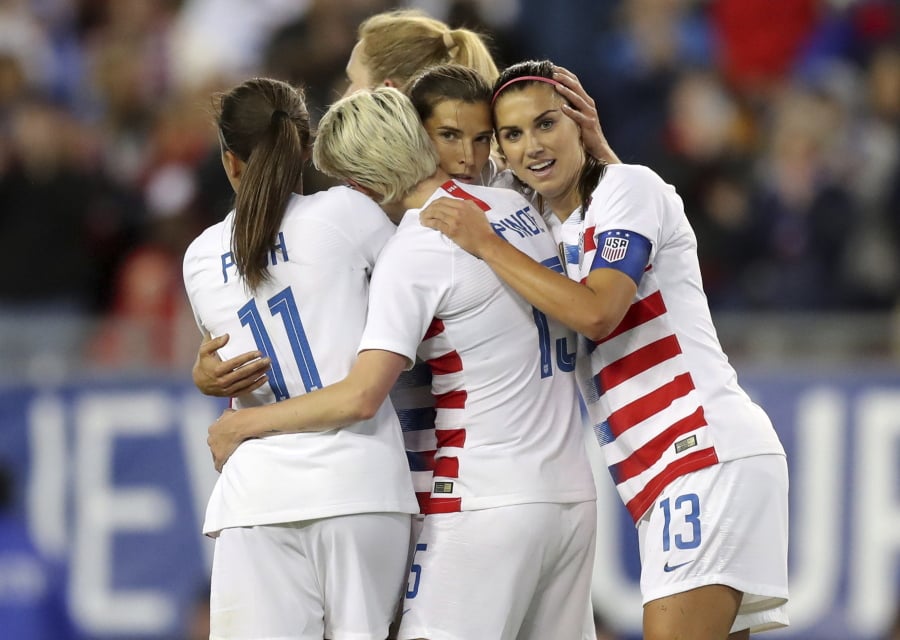 United States’ Tobin Heath, second from right, is congratulated on her goal by Mallory Pugh (11), Megan Rapinoe and Alex Morgan (13) during the first half of a SheBelieves Cup soccer match against Brazil Tuesday, March 5, 2019, in Tampa, Fla.