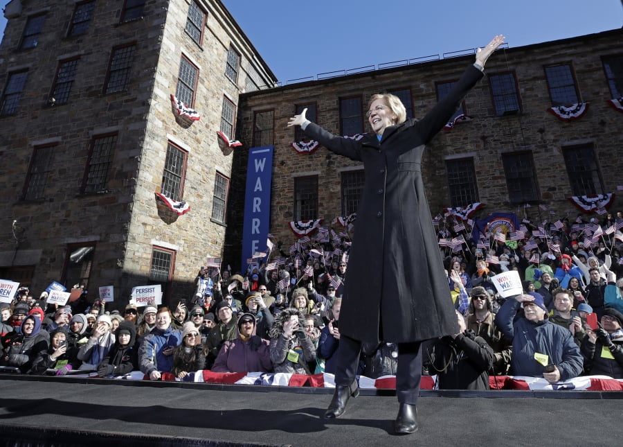 Sen. Elizabeth Warren, D-Mass., acknowledges cheers as she takes the stage Feb. 9 during an event to formally launch her presidential campaign in Lawrence, Mass.