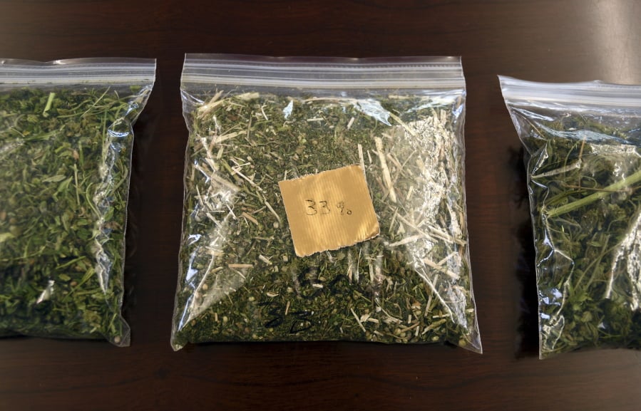Samples of hemp sit on a table in the conference room at Andrew Ross’ office in Denver on Friday, March 22, 2019. Ross, a Marine who served in Afghanistan and Iraq, is facing 18 years to life in Oklahoma if he is convicted after he was arrested in January while providing security for a load of state-certified hemp from Kentucky. Federal legalization for hemp has created a quandary for police as authorities lack the technology to distinguish marijuana from agricultural hemp at a roadside stop.