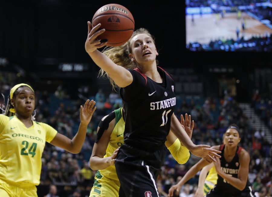 Stanford’s Alanna Smith (11) grabs a rebound against Oregon during the first half of an NCAA college basketball game in the final of the Pac-12 women’s tournament Sunday, March 10, 2019, in Las Vegas.