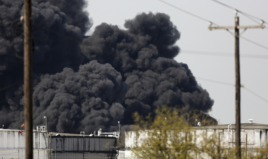 The petrochemical fire at Intercontinental Terminals Company reignited as crews tried to clean out the chemicals that remained in the tanks, Friday, March 22, 2019, in Deer Park, Texas. The efforts to clean up a Texas industrial plant that burned for several days this week were hamstrung Friday by a briefly reignited fire and a breach that led to chemicals spilling into the nearby Houston Ship Channel. (Godofredo A.