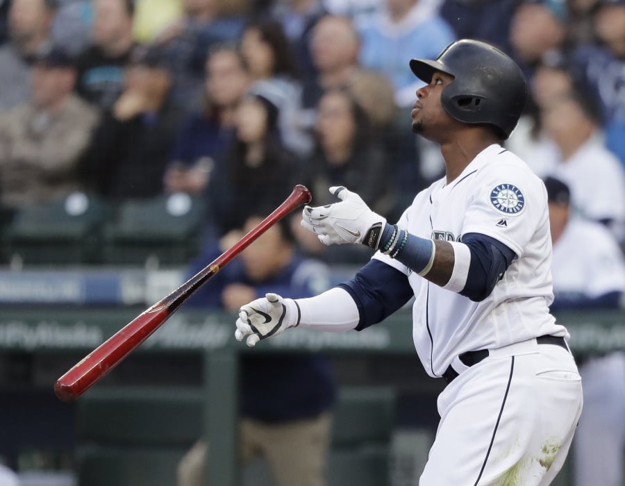 Seattle Mariners’ Tim Beckham watches his two-run home run against the Boston Red Sox during the third inning. Ted S.