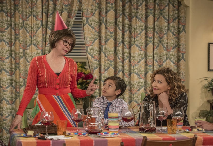 This image released by Netflix shows Rita Moreno, from left, Marcel Ruiz and Justina Machado in a scene from “One Day At A Time.” Fans and Latino diversity advocates are lamenting the end of two well-known Latino-themed television shows, Netflix’s “One Day at a Time” and CW’s “Jane the Virgin.” But other shows featuring U.S. Latino characters are trying to step in and capture the attention of fragmented audiences looking for diversity.