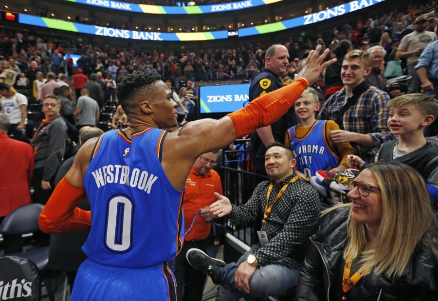 Oklahoma City Thunder guard Russell Westbrook (0) waves to the crowd as he leaves the court following an NBA basketball game against the Utah Jazz, on Monday, March 11, 2019, in Salt Lake City.