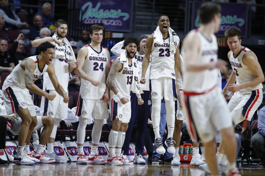 Gonzaga players celebrate as they lead Pepperdine with seconds left in the second half of an NCAA semifinal college basketball game at the West Coast Conference tournament, Monday, March 11, 2019, in Las Vegas.