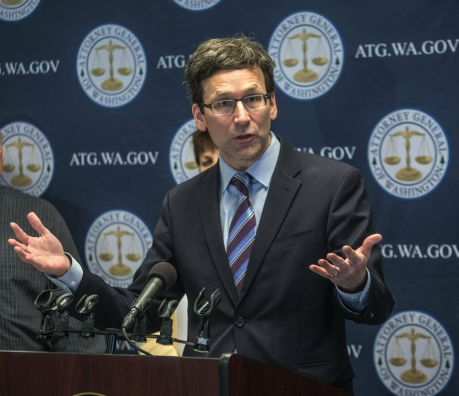 Washington Attorney General Bob Ferguson announces a major lawsuit against drug distributors related to Washington's opioid epidemic, Tuesday, March 12 2019 in Seattle.