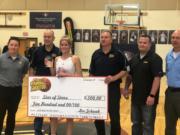 Prairie senior and Portland State commit Cassidy Gardner accepts the MVP award at the 24th annual Les Schwab Roundball Shootout at King's Way Christian.