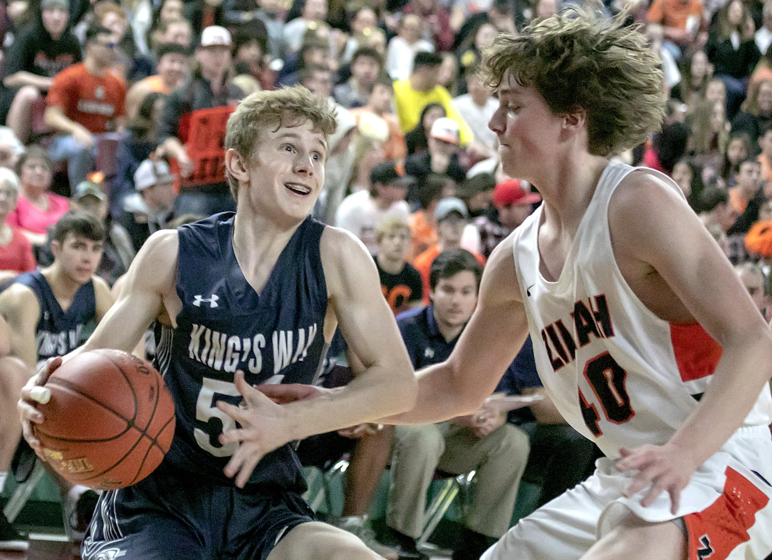 King's Way's Bryson Metz (55), goes for two points around Zillah's Claysen Delp (40), during the WIAA 1A boys state championships on Saturday, Mar. 2, 2019, at the Yakima Valley SunDome. The Zillah Leopards defeated the King's Way Christian Knights 90-68.