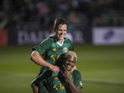 Foster Langsdorf jumps onto the back of teammate Dairon Asprilla in celebration of a goal scored by Asprilla during a T2 game against Las Vegas on Saturday, March 23, 2019.