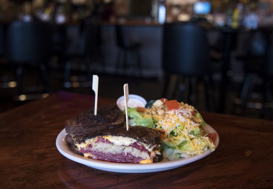 The Reuben sandwich with a side salad at 99 Saloon & Grill.