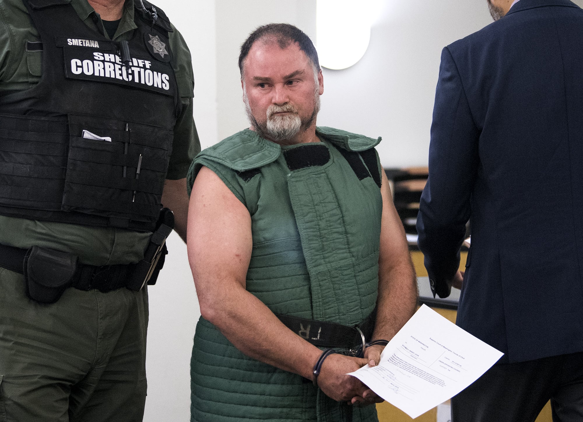 Randy John Schmidt, 47, appears Wednesday, April 10, 2019, in Clark County Superior Court to face an allegation of second-degree murder in the death of 52-year-old Michael Chad Holmes of Camas.
