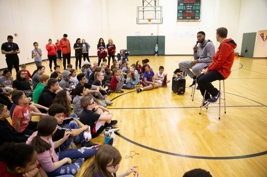 Bagley Downs: Portland Trail Blazer Moe Harkless surprised more than 70 kids at a youth basketball clinic in Vancouver on March 22. He led their clinic, answered questions, signed autographs and posed for pictures. Randy L.