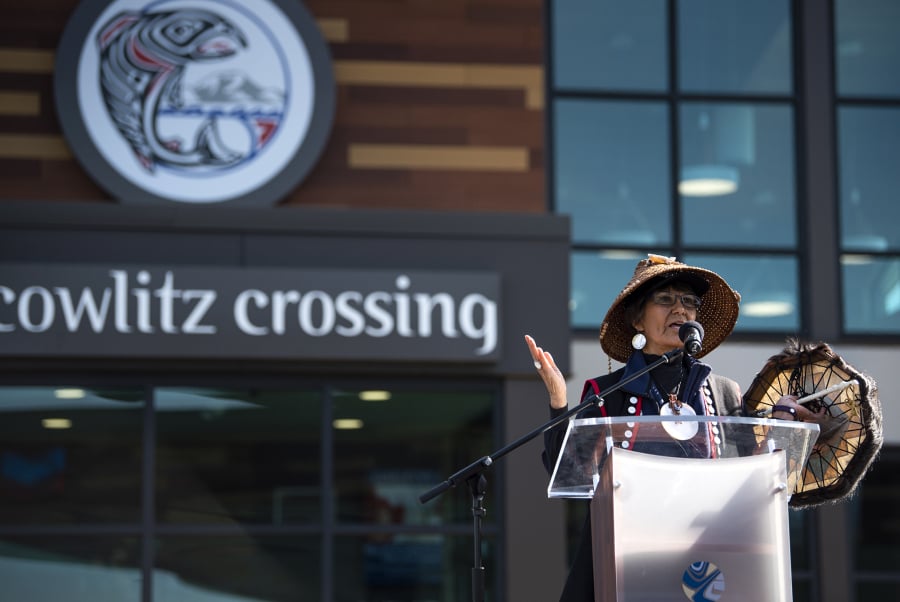 Cowlitz Indian Tribe spiritual leader Tanna Engdahl gives a blessing before the ribbon-cutting ceremony for the Cowlitz Crossing opening.