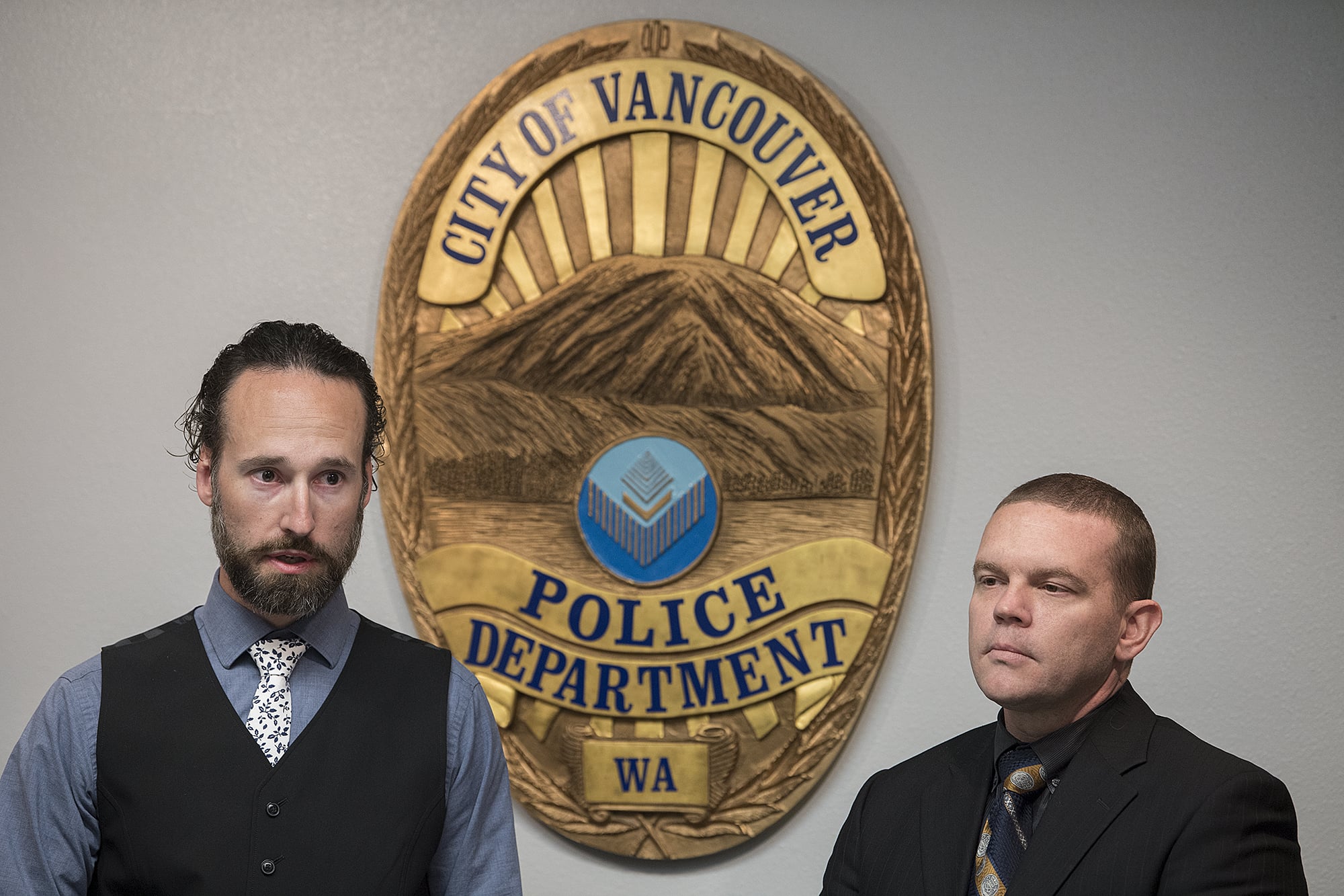 Det. Dustin Goudschaal, left, and Det. Cpl. Neil Martin speak to the media at Vancouver Police Department headquarters after making an arrest in the murder of Audrey Hoellein on Tuesday afternoon, April 30, 2019.