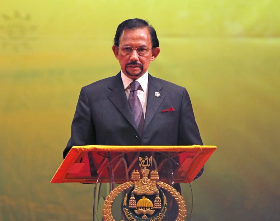 In this Oct, 10, 2013, photo, Brunei’s Sultan Hassanal Bolkiah speaks during the closing ceremony and handover of the ASEAN Chairmanship to Myanmar in Bandar Seri Begawan. The sultan announced to implement Islamic criminal laws that punishes gay sex by stoning offenders to death. The legal change in the tiny, oil-rich monarchy, which also includes amputation for theft, is due to come into force Wednesday, April 3, 2019.