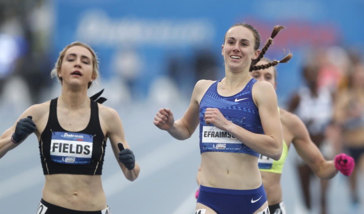 Alexa Efraimson, right, beats Hannah Fields, left, to the finish line in the women’s special 1500-meter run at the Drake Relays athletics meet, Saturday, April 27, 2019, in Des Moines, Iowa.
