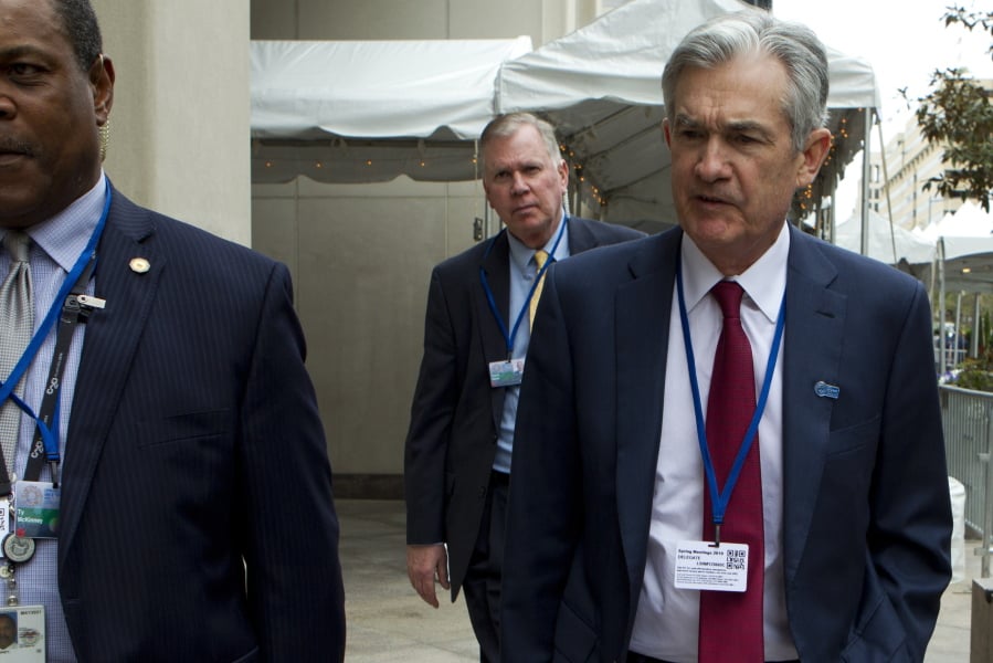 Federal Reserve Board Chair Jerome Powell accompanied by his security detail, leaves after attending a G20 meeting at the World Bank/IMF Spring Meetings in Washington, Thursday, April 11, 2019.