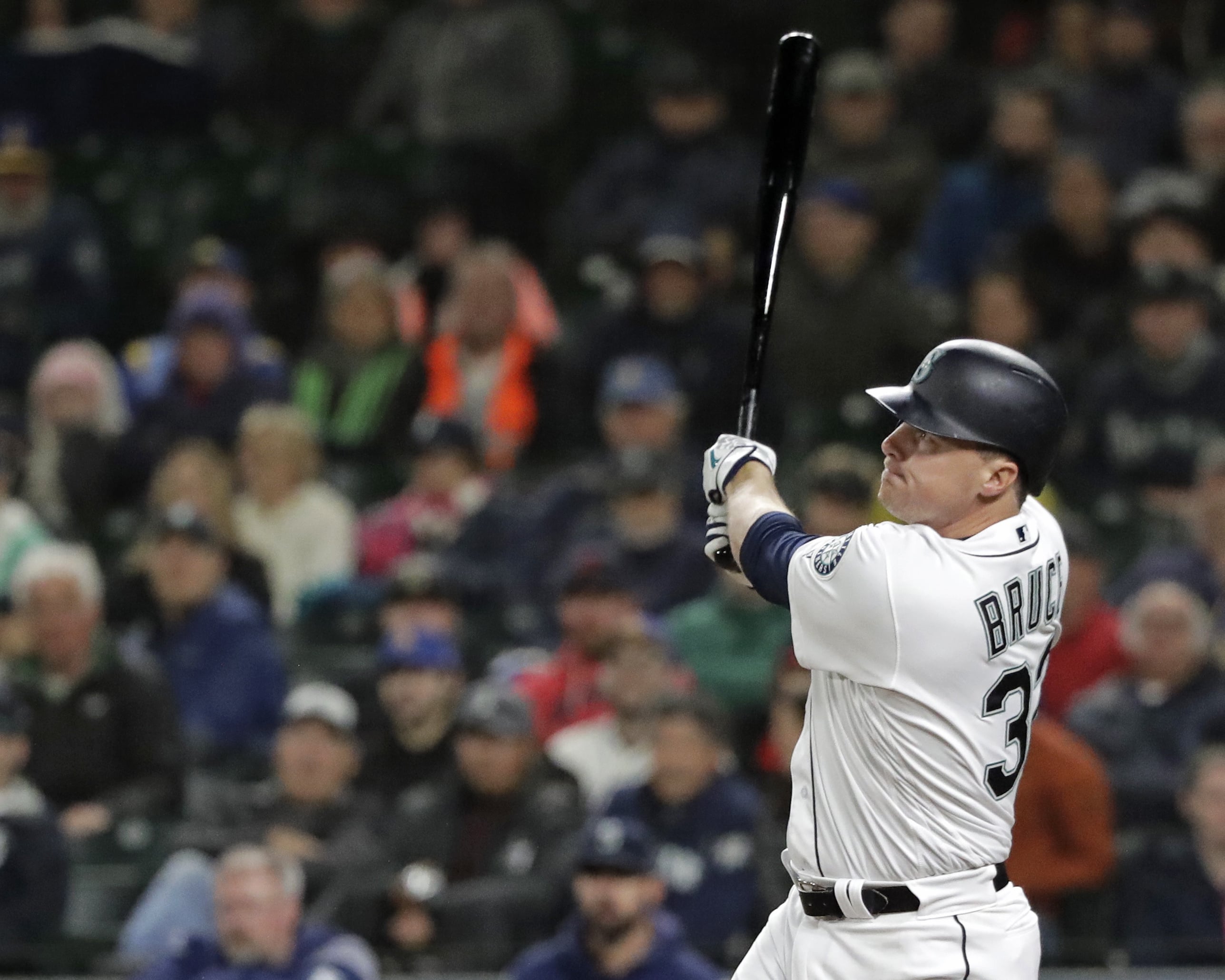 Seattle Mariners' Jay Bruce watches his solo home run during the eighth inning of the team's baseball game against the Cleveland Indians, Tuesday, April 16, 2019, in Seattle. (AP Photo/Ted S.