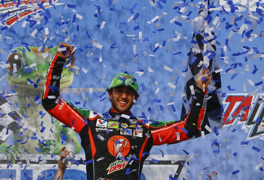 Chase Elliott celebrates after winning a NASCAR Cup Series auto race at Talladega Superspeedway, Sunday, April 28, 2019, in Talladega, Ala.