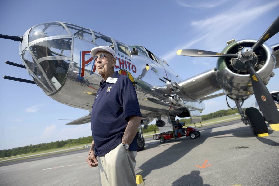Doolittle Raider Lt. Col. Dick Cole stands in front of a B-25 in Destin, Fla., in April 2013 before a flight as part of the Doolittle Raider 71st Anniversary Reunion.