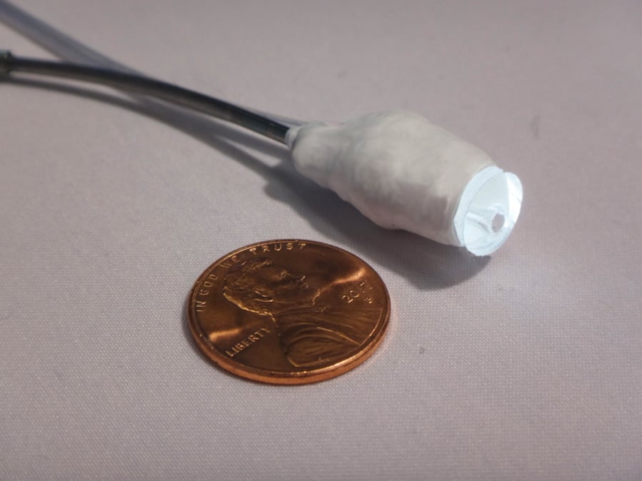 The tip of a robotic catheter equipped with a small camera and lighting encased in silicone, in Boston. Described in a report released on Wednesday, the device guided itself through the delicate chambers of a pig’s heart as it was beating.