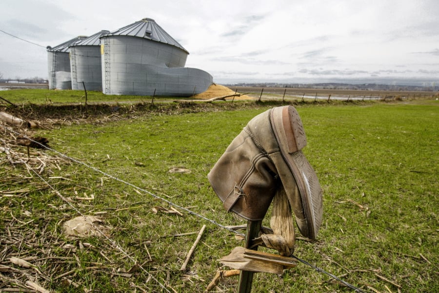 In this Wednesday, April 10, 2019 photo, destroyed grain silos, a result of flooding, spill corn onto a muddy field, are seen on a farm in Bellevue, Neb. Extensive flooding along the Missouri River has led to blistering criticism of the Army Corps of Engineers’ management of dams and levees that control conditions along the waterway. A Wednesday, April 17, 2019, field hearing in Glenwood, Iowa, before a U.S. Senate panel likely will be dominated by calls to change the Corps’ priorities to put greater emphasis on protecting people and property.