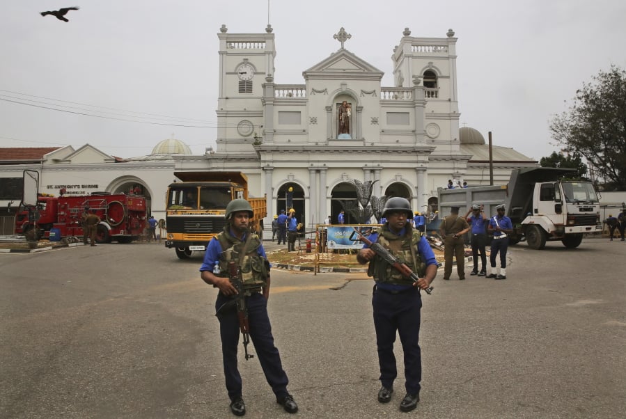 Sri Lankan Naval soldiers stand outside damaged St. Anthony’s Church, in Colombo, Saturday, April 27, 2019. Sri Lankan security forces have found 15 bodies, including six children, after militants linked to the Easter bombings set off explosives during a raid on a house in the country’s east.