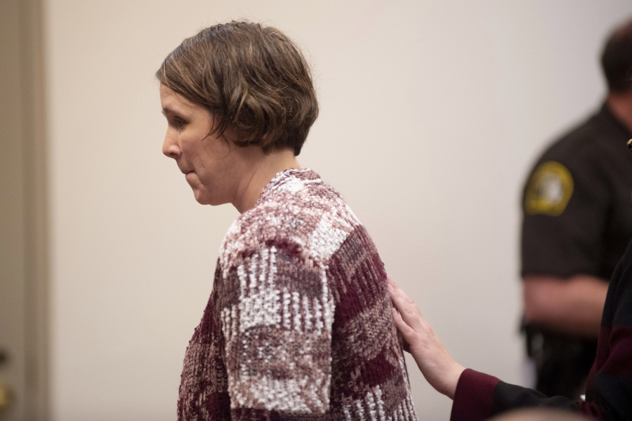 Tiffany Kosakowski appears before Judge Curt Benson at the Kent County Courthouse on Thursday, April 18, 2019 in Grand Rapids, Mich. Kosakowski pleaded guilty to reckless driving for running over her 9-year-old son while dropping him off at school and has been ordered to serve 30 days in jail. Benson sentenced her Thursday to 6 months in jail, with all but 30 days suspended.