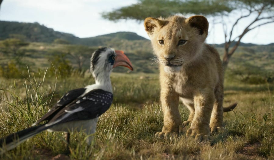 Zazu, voiced by John Oliver, left, and Simba, voiced by JD McCrary, in a scene from “The Lion King,” directed by Jon Favreau.