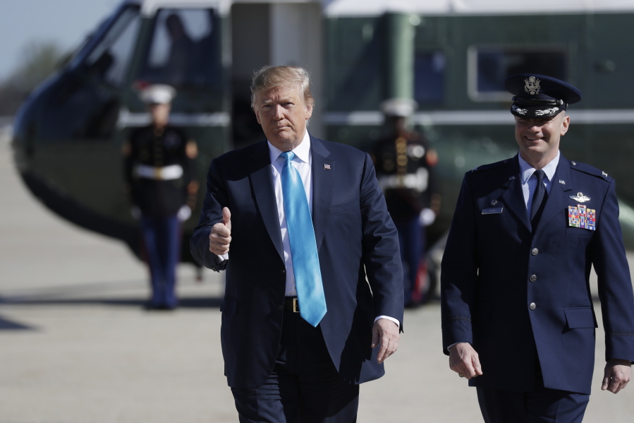 President Donald Trump walks to board Air Force One for a trip to Texas, Wednesday, April 10, 2019, at Andrews Air Force Base, Md.