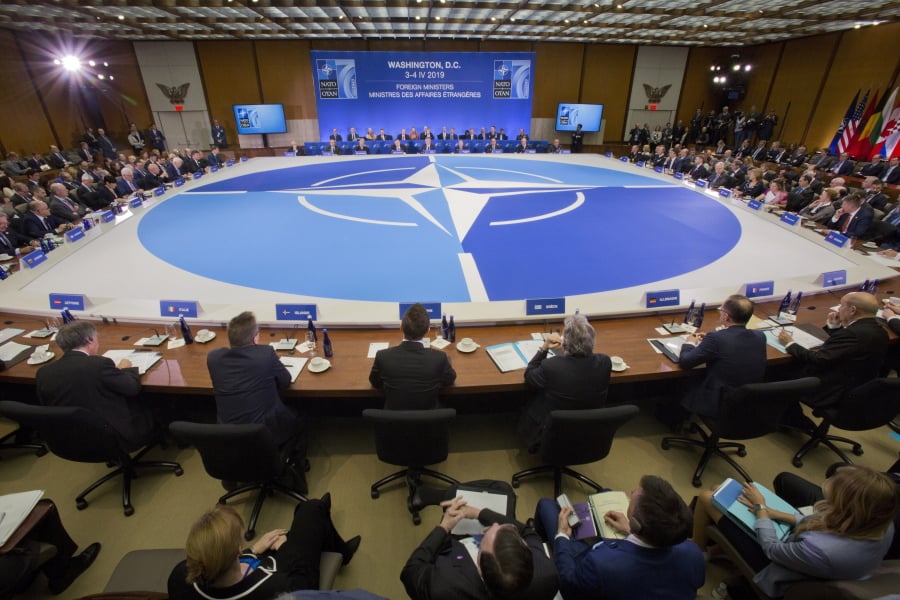 NATO’s Secretary General Jen Stoltenberg, center, looks on as Secretary of State Mike Pompeo makes opening remarks at the Meeting of the North Atlantic Council in Foreign Ministers’ Session 1 at the US State Department in Washington, Thursday, April 4, 2019.