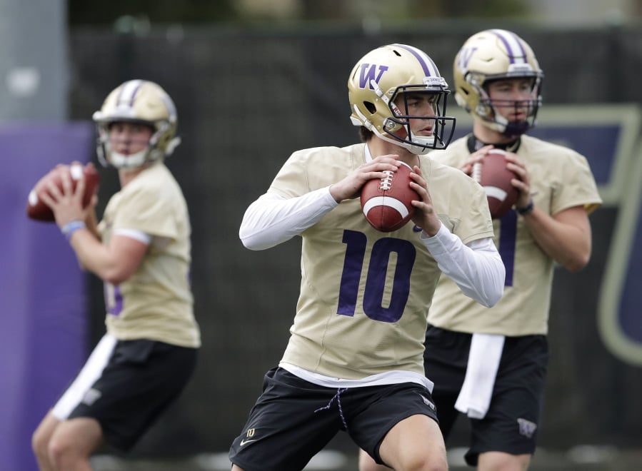 Washington quarterback Jacob Eason (10) drops to pass during the first day of spring NCAA college football practice, Wednesday, April 3, 2019, in Seattle. (AP Photo/Ted S.