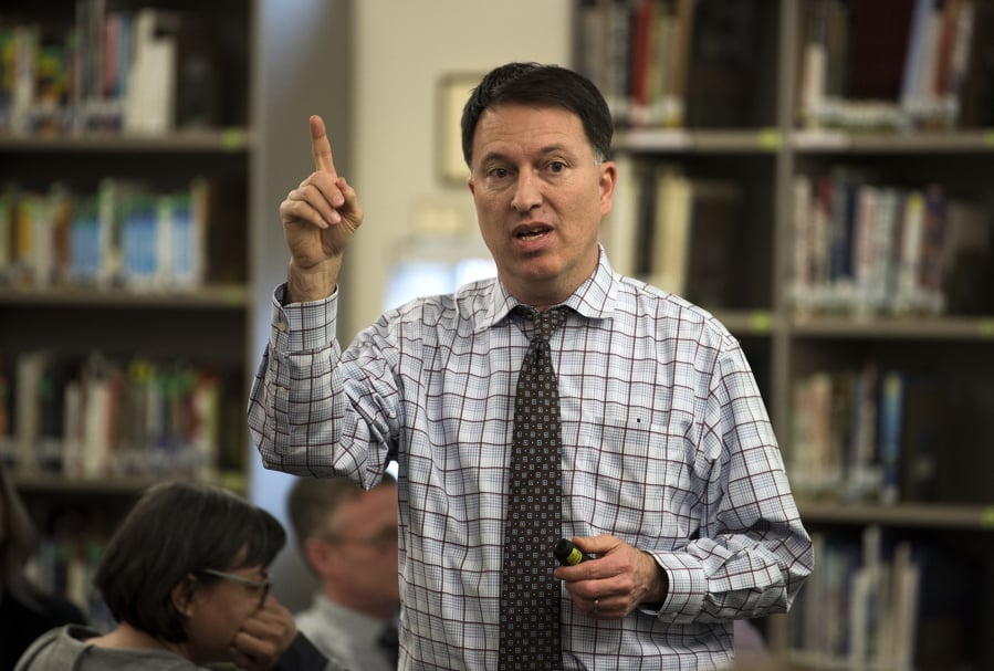 Superintendent Mike Merlino opens up a public forum in May 2019 for community members to voice their input on the district budget reductions at Heritage High School in Vancouver.