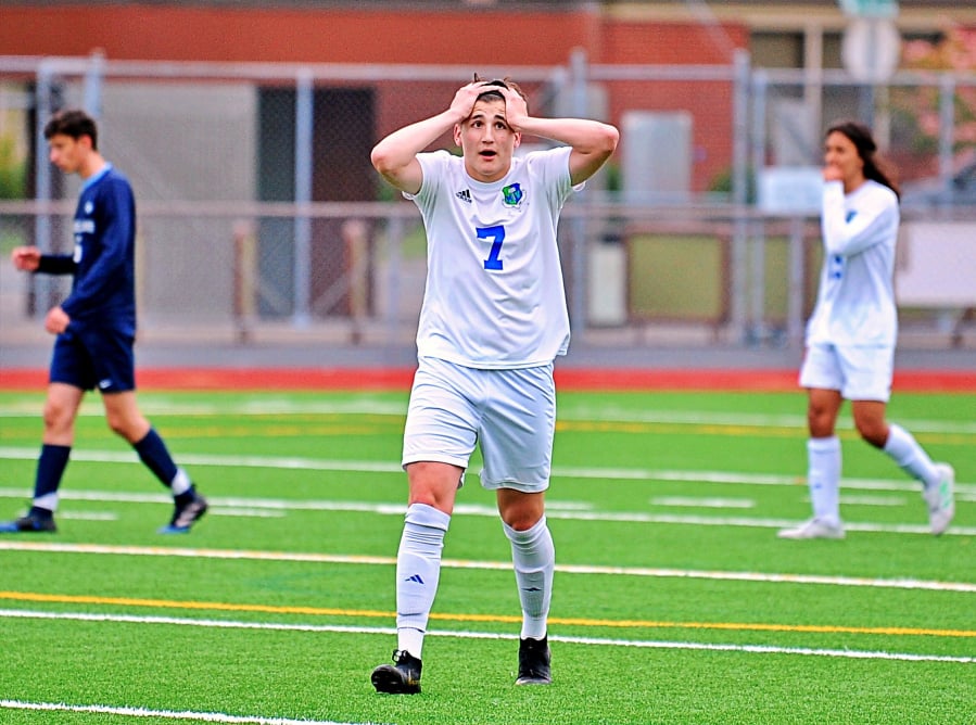 Mountain View's Christopher Grozav reacts to his teammate's missed shot in a 3A State third-place game Saturday at Carl Sparks Stadium in Puyallup. Interlake won 2-0.