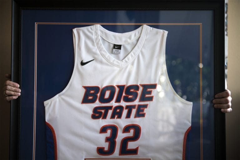 Beth and John Moritz of Vancouver hold their son´s Boise State University basketball jersey. Zach Moritz contracted Lyme disease in Denmark, which led to declines in his mental and physical health. Zach died by suicide in August 2015.