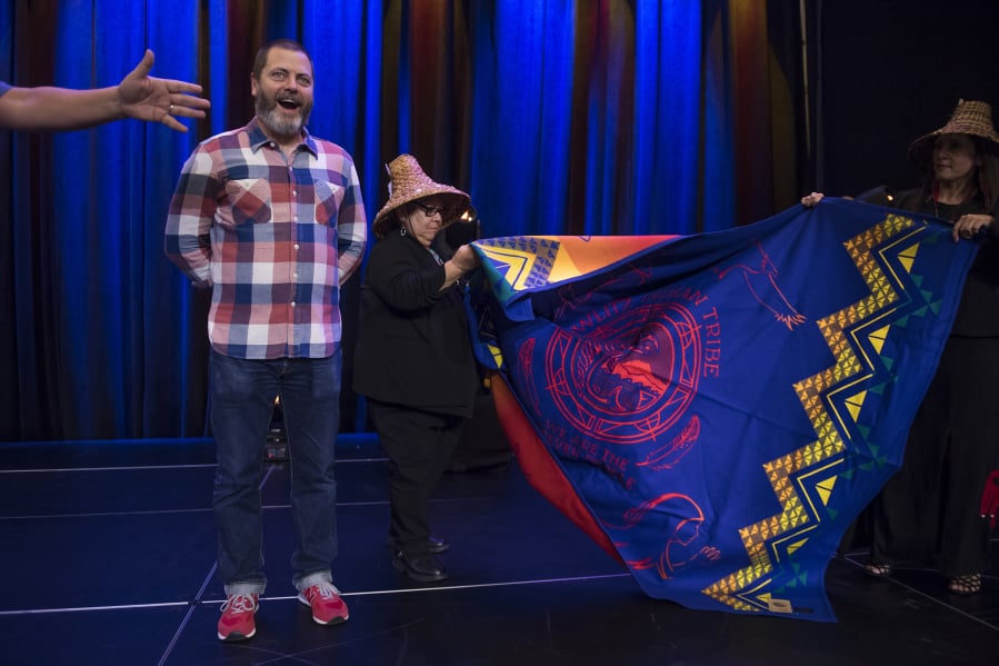 Actor and comedian Nick Offerman reacts to the announcement that he is being given a Cowlitz Indian Tribe blanket made by Pendleton Woolen Mills following a performance in the Cowlitz Ballroom at ilani.