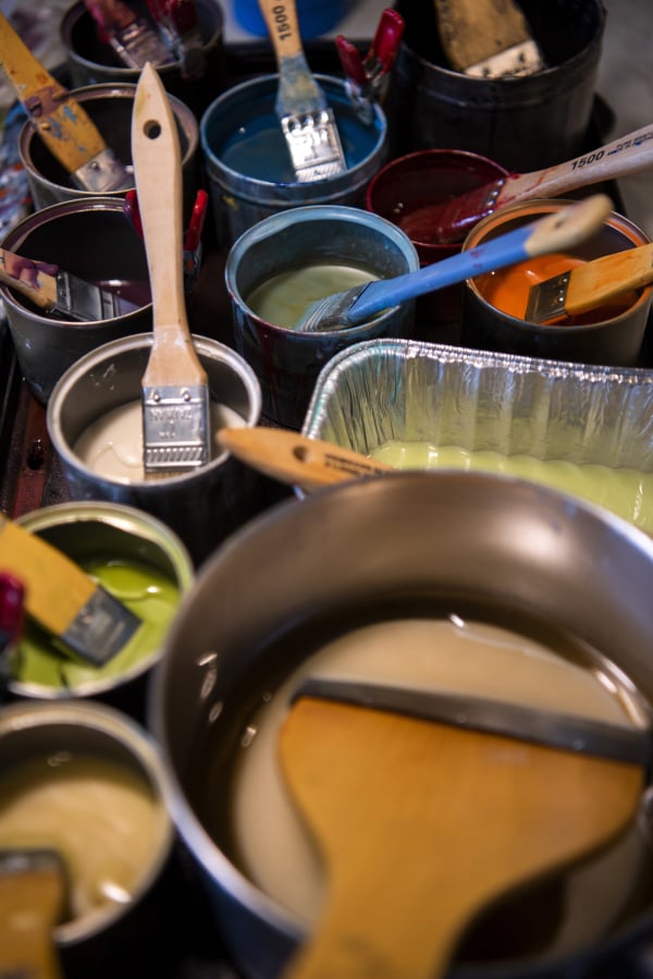 Many colorful mixtures of encaustic (beeswax) and dammar resin sit Tracy Simpson’s home studio in Washougal, ready to go; all she has to do is melt them, or make some more, to start adding colors to her works in progress.