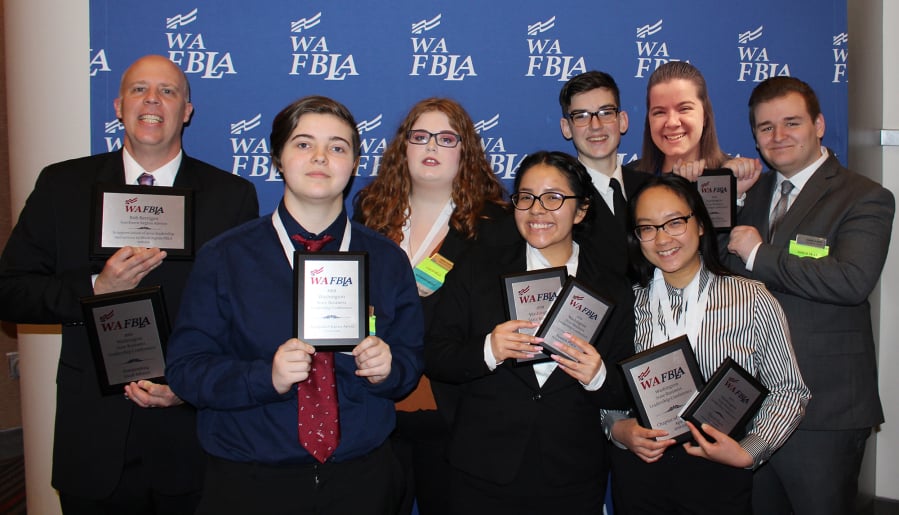 Orchards: Members of the Heritage High School Future Business Leaders of America chapter, which brought home 20 awards from the state conference in Bellevue.