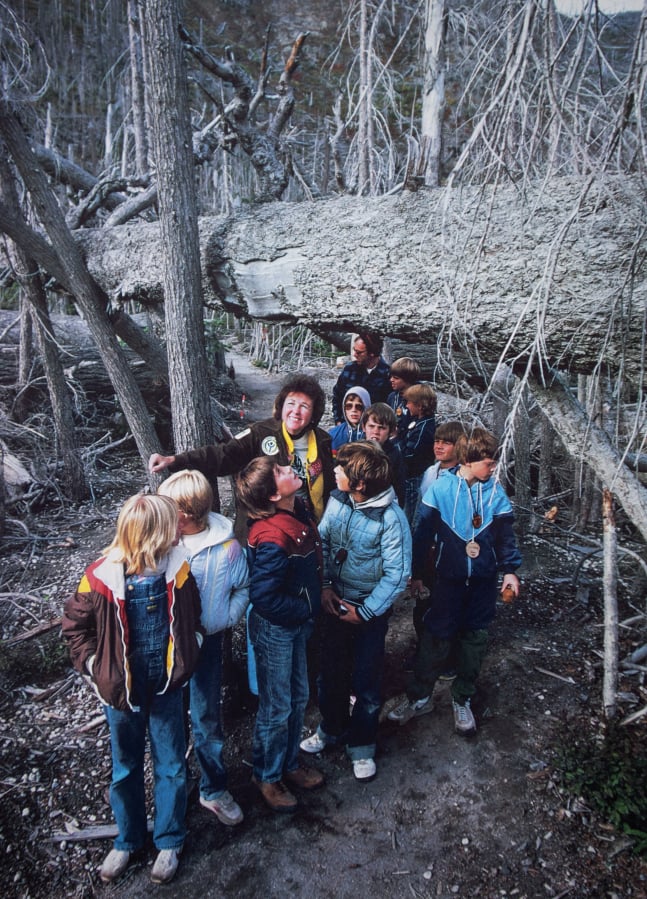 This photo that appeared in National Geographic World shows Allene Wodaege and Ron Ward with a group of 10 fifth-graders from Ridgefield during a 1983 into Mount St. Helens blast zone.