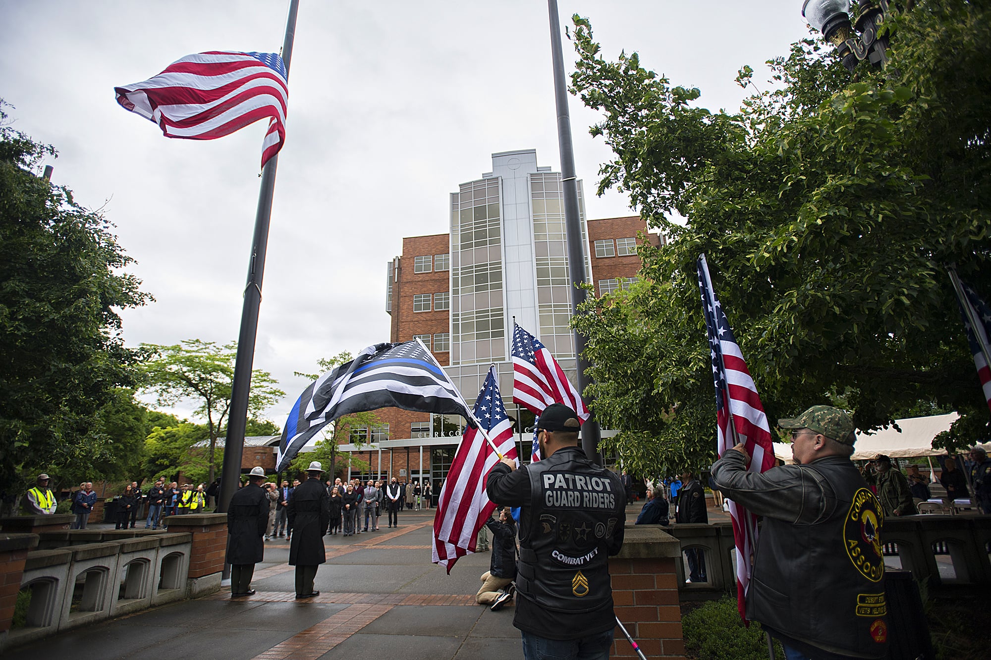 Members of the Patriot Guard Riders show their patriotic spirit as the flag is raised during the Clark County Law Enforcement Memorial outside the Clark County Public Service Center on Thursday morning, May 16, 2019. The ceremony honors fallen heroes who were killed in the line of duty.