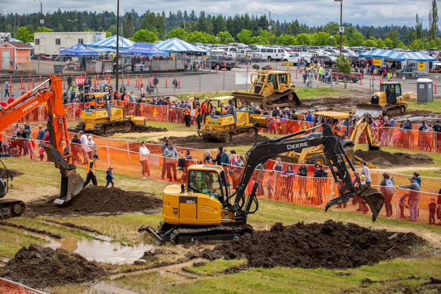 Kids of all ages take the driver’s seat in dozers, loaders and excavators during Dozer Day at the Clark County Event Center at the Fairgrounds on Sunday.