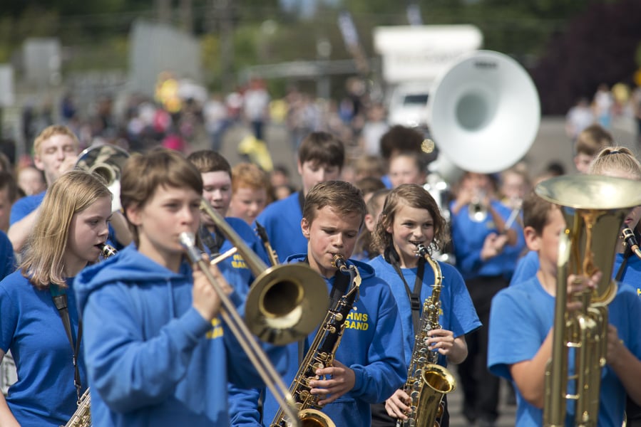 The Hockinson Middle School Marching Band participates in the Hazel Dell Parade of Bands on a sunny Saturday afternoon.