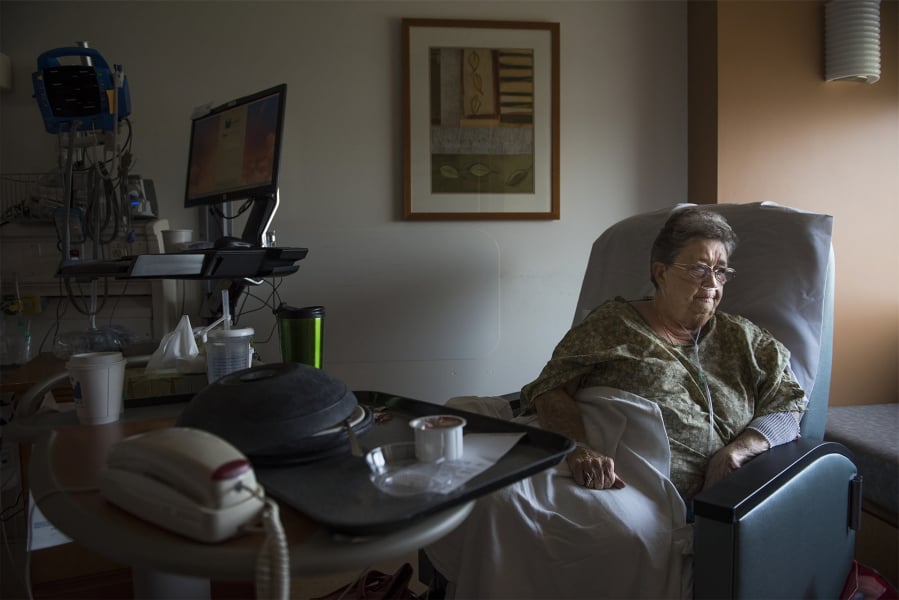 Darlene Hunt, 76, of Vancouver, rests while at Legacy Salmon Creek Medical Center in 2018. Hunt, who has COPD, was admitted to Legacy for complications from poor air quality. Hunt falls into sensitive groups, who are more susceptible to encountering medical complications from poor air quality.